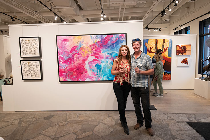 Carrie Wild and Jason Williams of Gallery Wild enjoying themselves during the festive Friday event.